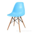 Plastic dining chair with wood legs